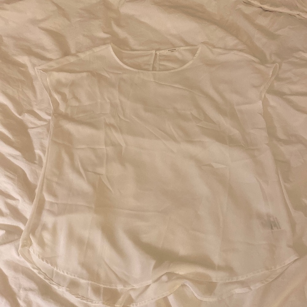 White large shirt by Pleione